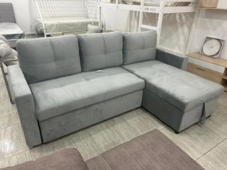 Sofá cama gris con arcón