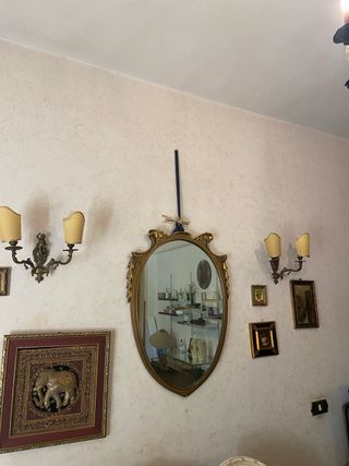 Specchio ovale con applique