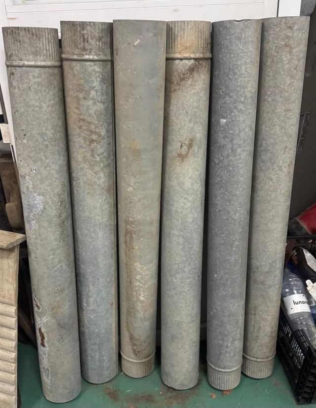 Tubos de chimenea metálicos con sombrero