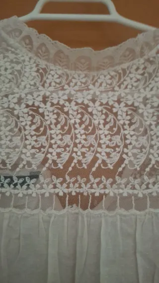 Blusa sin mangas de encaje blanco