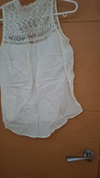 Blusa sin mangas de encaje blanco