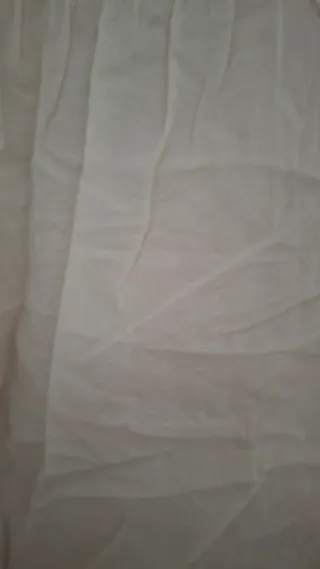 Blusa sin mangas de encaje blanco