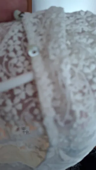 Blusa sin mangas de encaje blanco