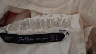 Blusa sin mangas de encaje blanco