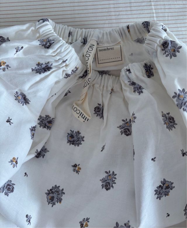 Mochila, bolsa impermeable y babero t.2 Minicoton