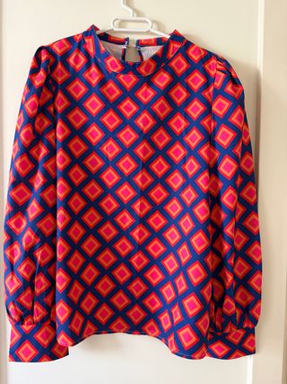 Blusa manga larga estampada