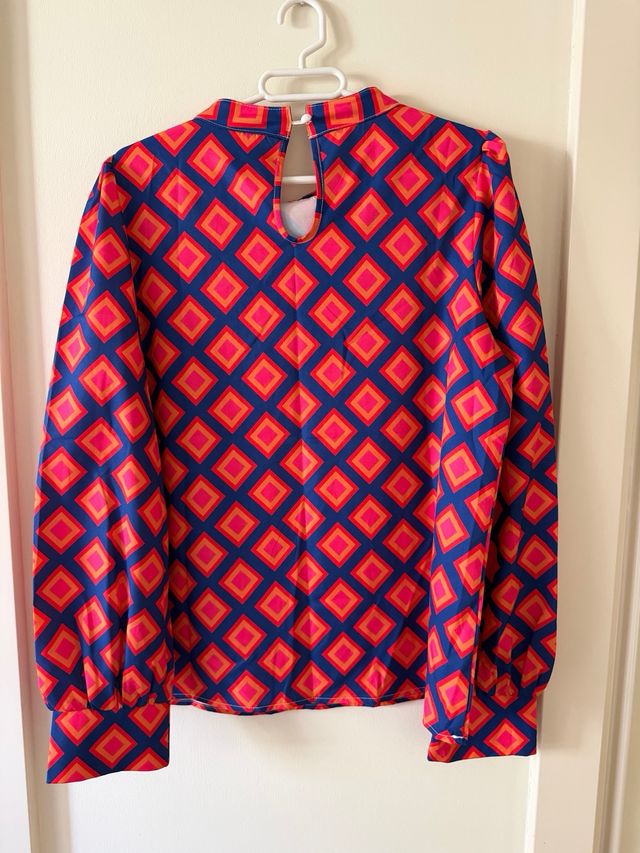 Blusa manga larga estampada