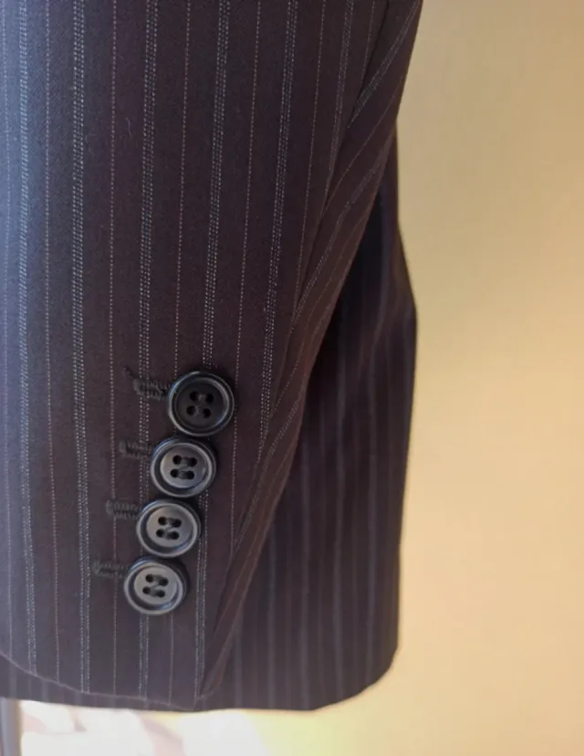 Completo uomo grigio e nero