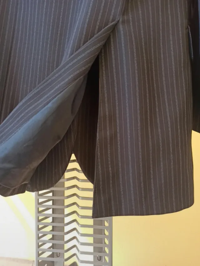 Completo uomo grigio e nero