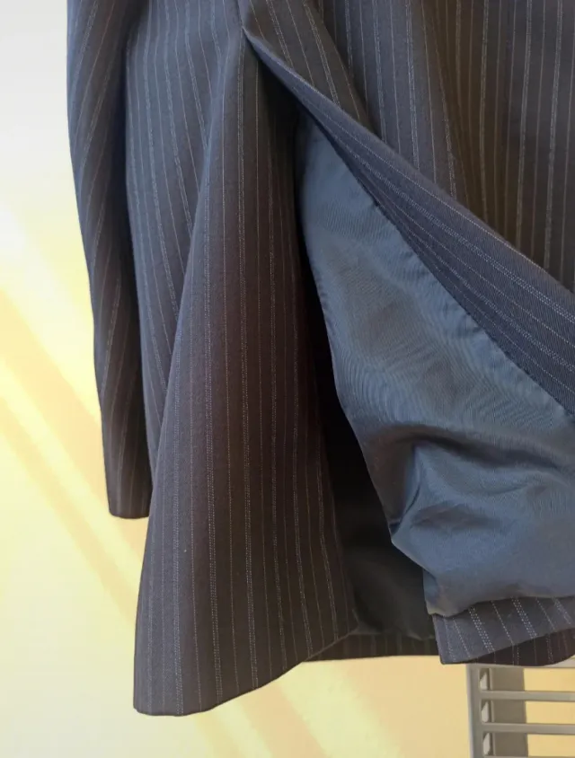 Completo uomo grigio e nero