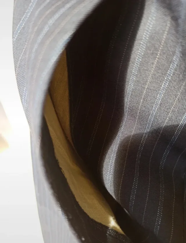 Completo uomo grigio e nero