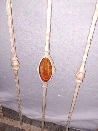 Pasamano de forja con detalle ovalado