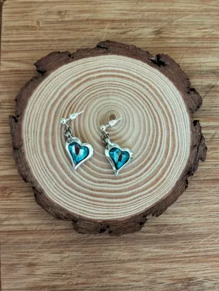 Pendientes corazón cristal azul.