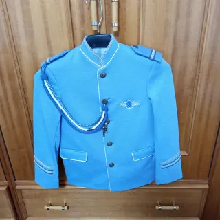 Chaqueta de comunión azul con cordones