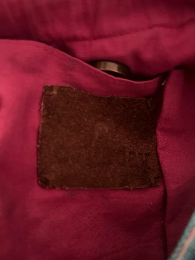 Bolso étnico multicolor con pompones