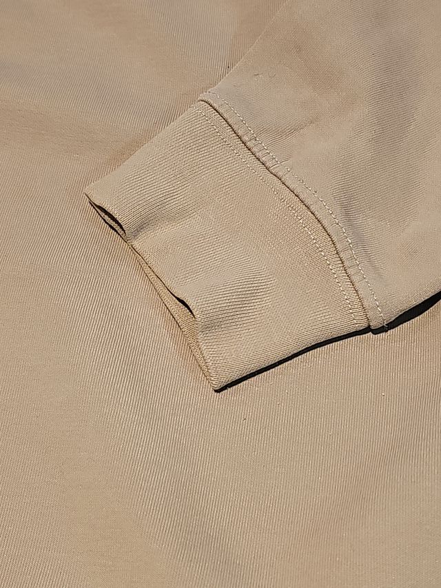 Sudadera beige cuello alto