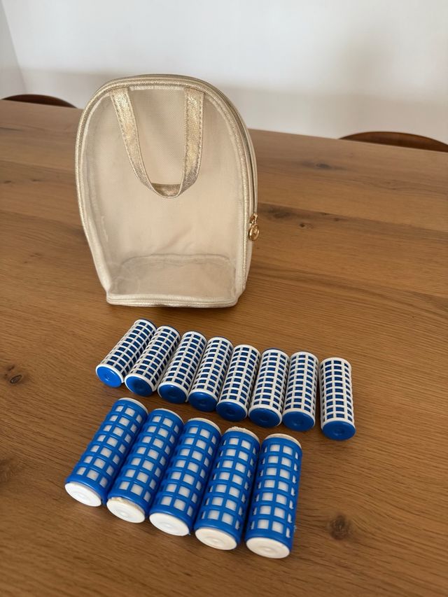 Rulos de agua caliente con neceser dorado