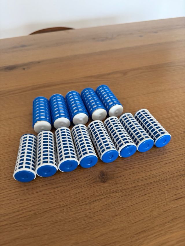 Rulos de agua caliente con neceser dorado