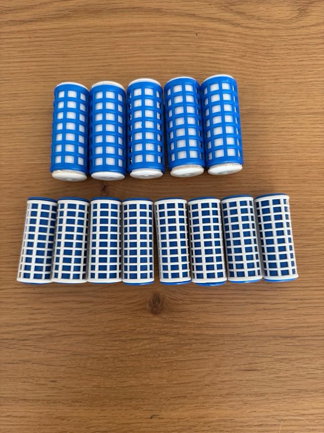 Rulos de agua caliente con neceser dorado