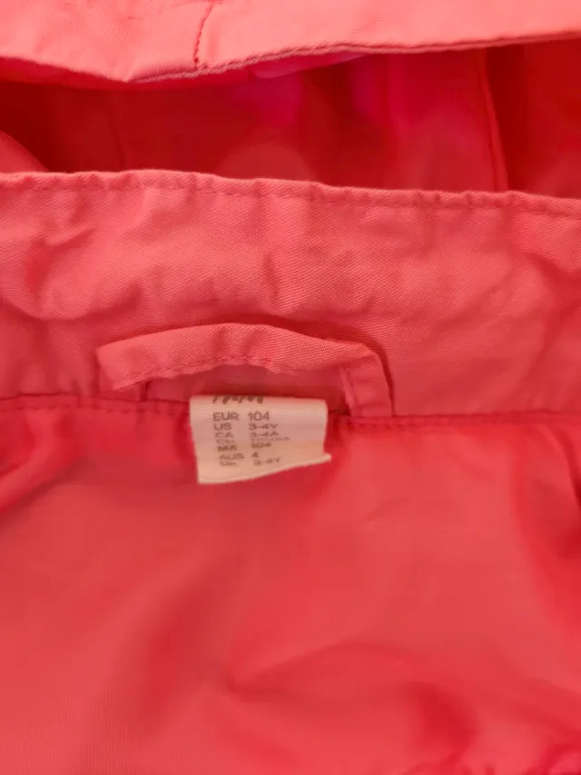 Cortavientos rosa H&M con orejitas