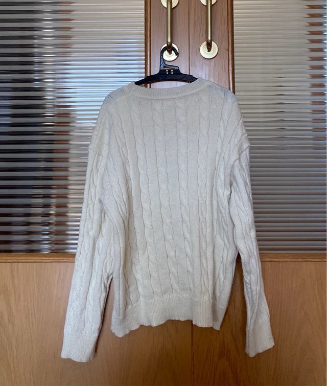 Jersey de punto trenzado color crema