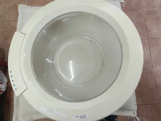 Puerta Lavadora Siemens.