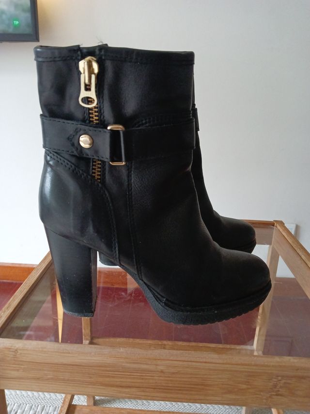 Botas piel negras tacón alto cremallera dorada