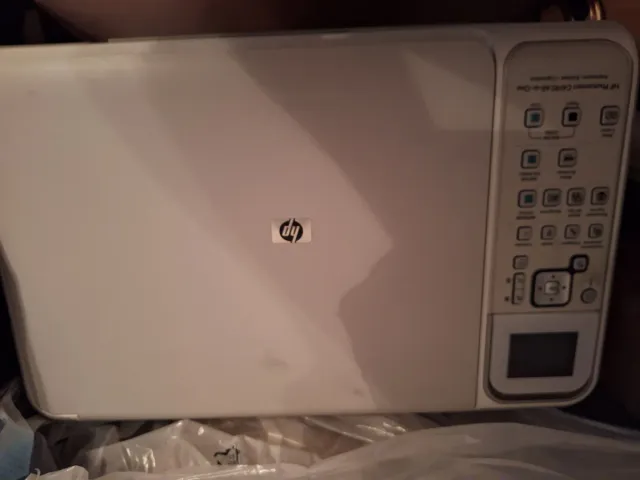 Impresora HP Beige y Blanca