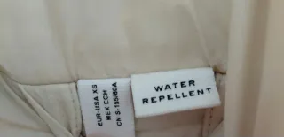 Chaqueta de plumas beige crema