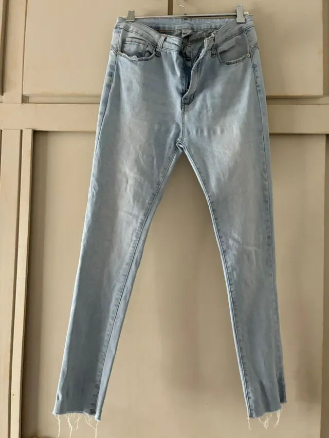 Vaqueros azul claro, Talla 38 (Mujer).