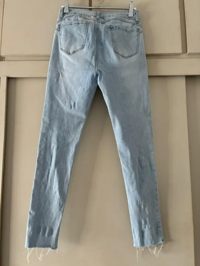 Vaqueros azul claro, Talla 38 (Mujer).