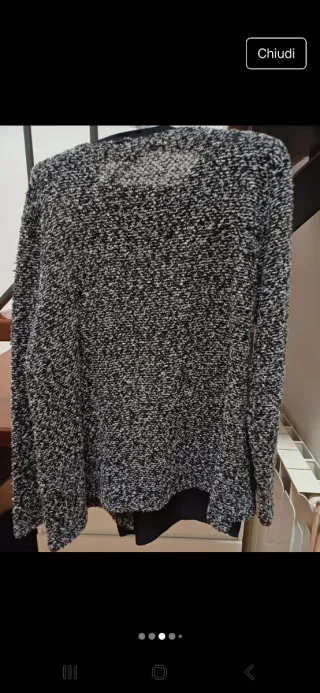 Blusa elegante con bottone gioiello