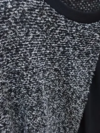 Blusa elegante con bottone gioiello