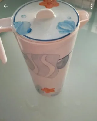 Caraffa Thun con pesci e conchiglie