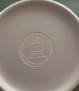 Caraffa Thun con pesci e conchiglie