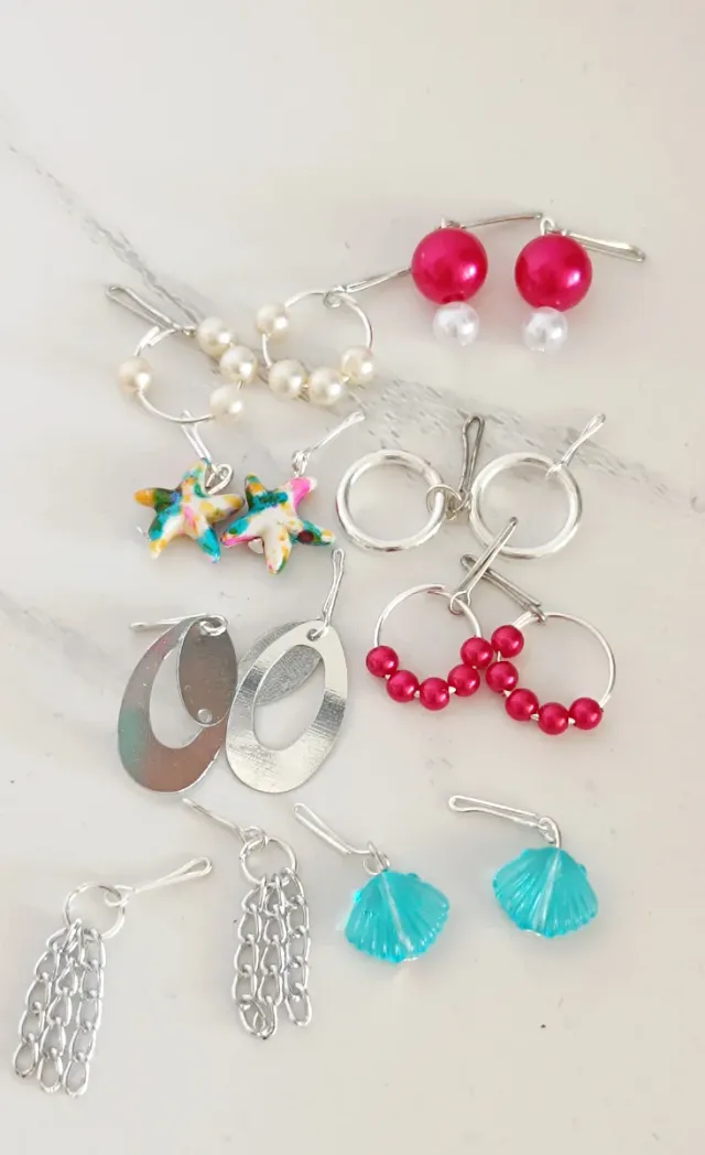 Lote 8 pares pendientes varios