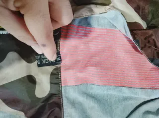 Giacca con cappuccio camouflage