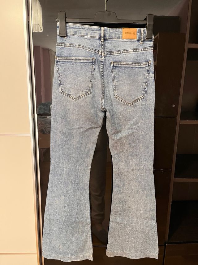 Vaqueros acampanados azules