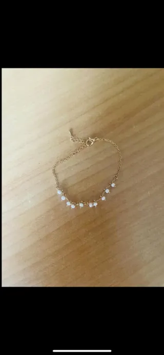 Bracciale o cavigliera con perline bianche