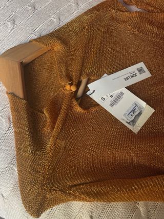 Blusa brillante cobriza