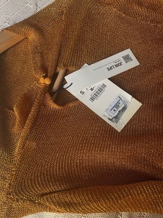 Blusa brillante cobriza