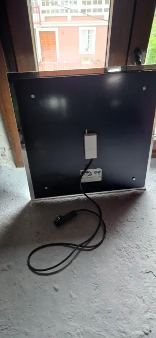 Estufa eléctrica,acabado espejo