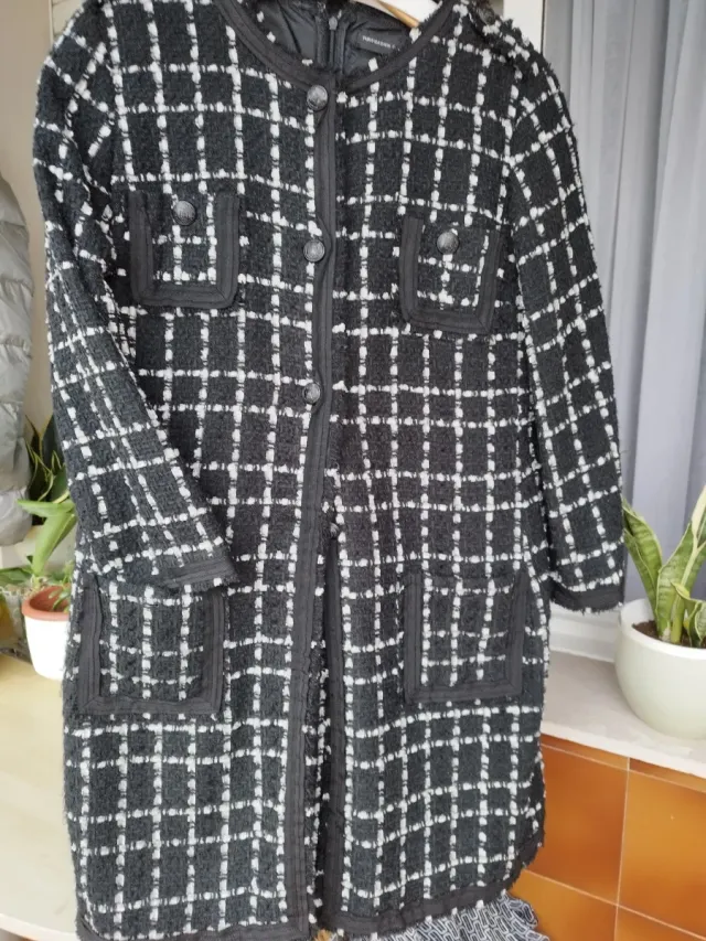 Abrigo y vestido de Purificación García