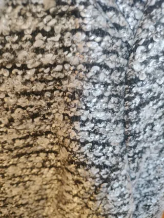 Chaqueta H&M tejido gris y negra Se puede lavar.