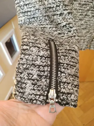 Chaqueta H&M tejido gris y negra Se puede lavar.
