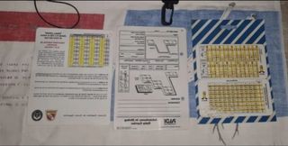 Tablas de buceo y brújula