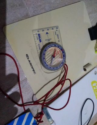 Tablas de buceo y brújula