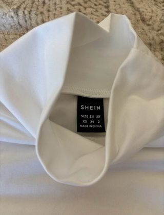 Maglietta collo alto bianca