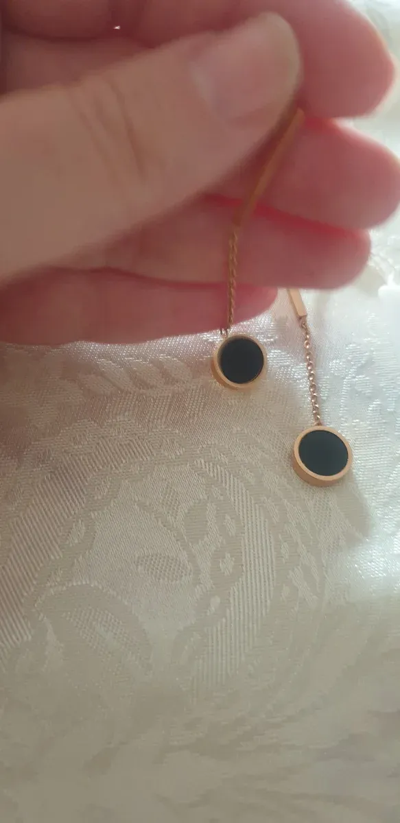 Orecchini pendenti cerchio nero oro