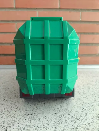 Camión de basura de juguete verde